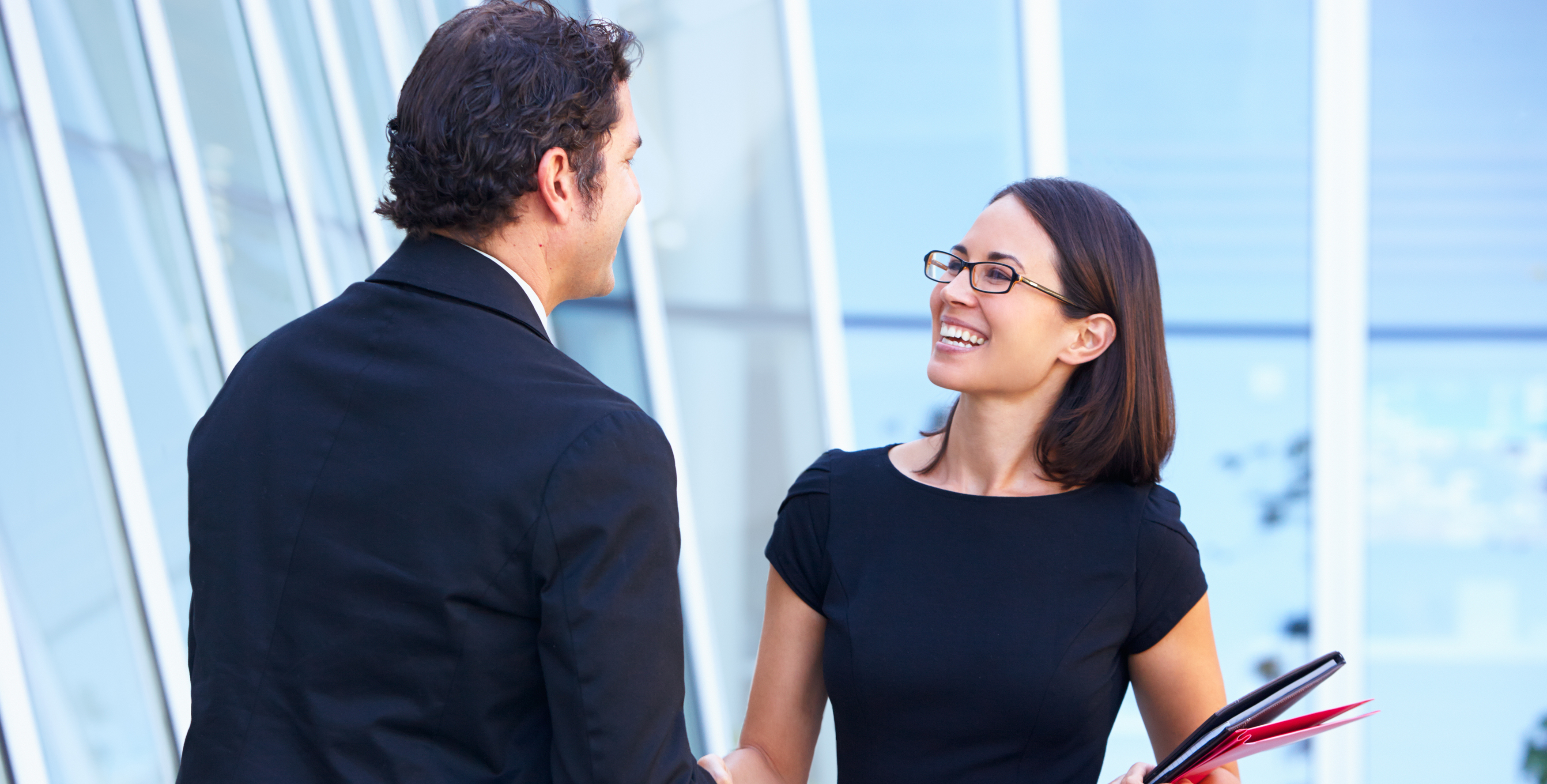 Man & women shaking hands